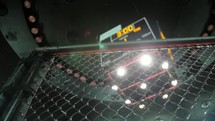 MMA - Cage Close Up with Shining Lights and Time Clock