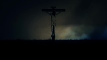 Jesus Crucifixion Under a Stormy Dark Sky on Mount Calvary in Jerusalem