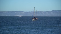 Sailboat Passing Through San Francisco Bay	
