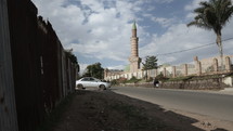 Time Lapse View Of Mosque Minaret In African Town