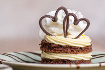 chocolate hearts on a cake slice 