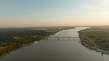 Drone Video of Mississippi River in Natchez, Mississippi at Sunset Looking South. High quality 4k footage