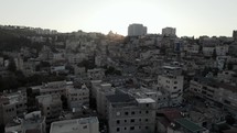 Middle eastern city drone shot of homes aerial war zone conflict