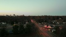 drone shot of traffic in a small town 