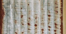 Abstract textures and patterns - metal wall panels with rust and corrosion stains