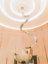 modern art sculpture in silver 