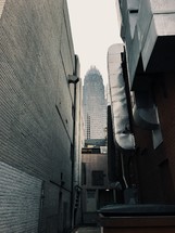 back alley and skyscraper view 