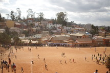 dirt sports field in a village 