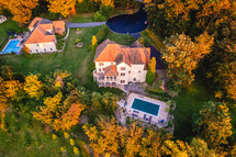 Aerial view of large house with a pool