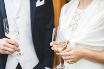 bride and groom toasting 