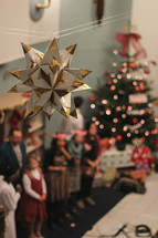 children singing in a Christmas performance 