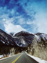 road through winter mountain landscape 