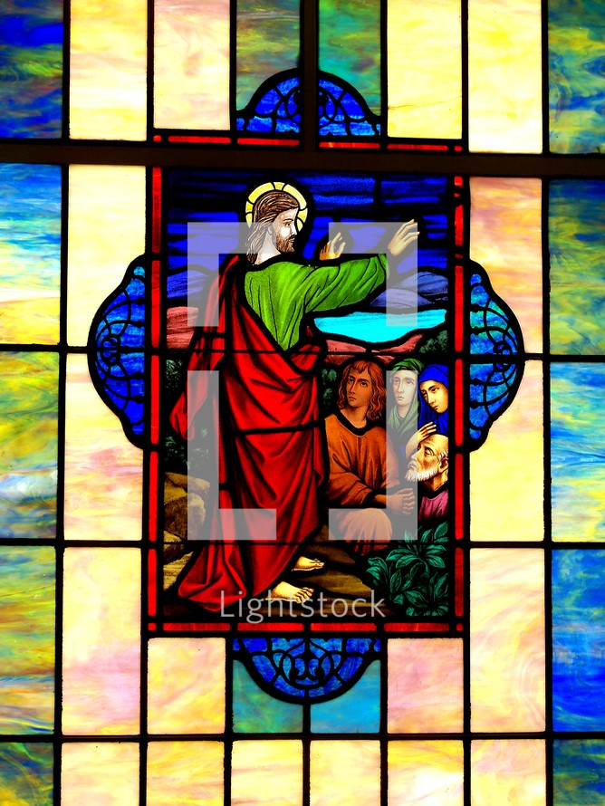 Jesus teaching stained glass window 