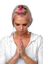 teen girl with head bowed in prayer