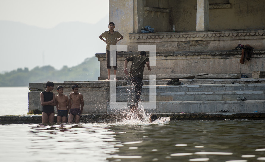 boys swimming in India 