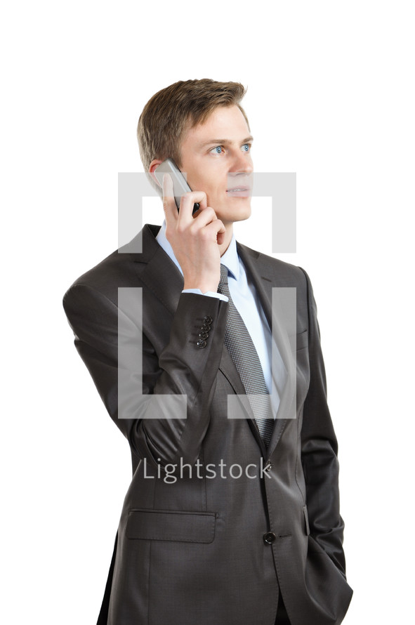 Businessman holding a cell phone.