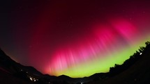 Aurora Borealis from Slovakia, Central europe, Colorful aurora over the hilly rural landscape,