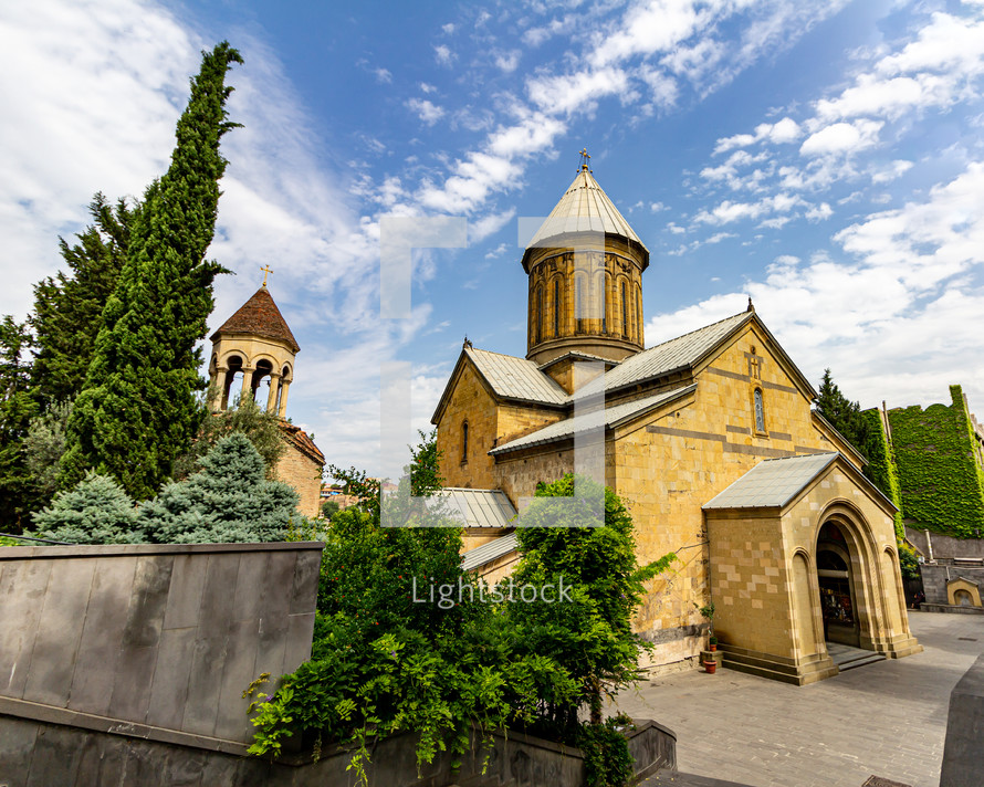Sioni Cathedral, one of the many Georgian Orthodox churches in Tbilisi, Georgia, is in Old Town surrounded by trees