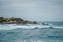 A rocky promontory by the ocean.