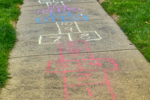 hop scotch board in sidewalk chalk 