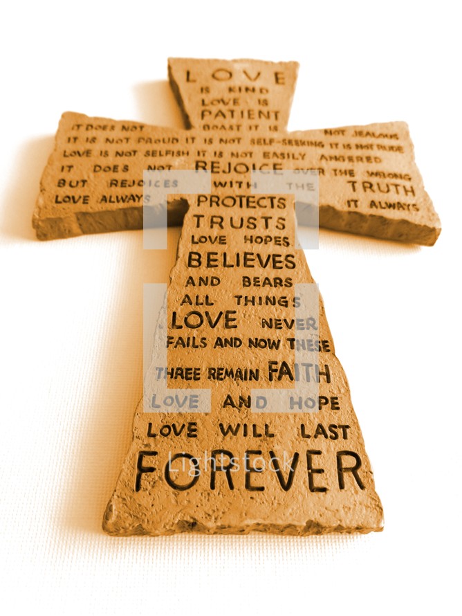Cross of Christ with faith, love, hope, trust, believes, protects, words from the bible of hope, faith and love that will last. 