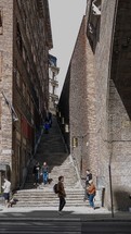 steps between buildings in a alley 