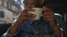 a man drinking coffee in Gothenburg, Sweden