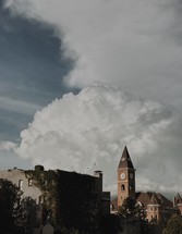 church steeple under stormy skies 