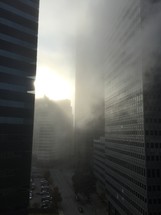 smoke and fog around a city building 