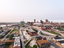 A complete aerial landscape view of downtown Saint Louis, Missouri city on a clear sky day with bridges and skyscrapers.