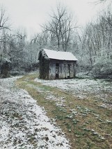 a rural shed with snow 