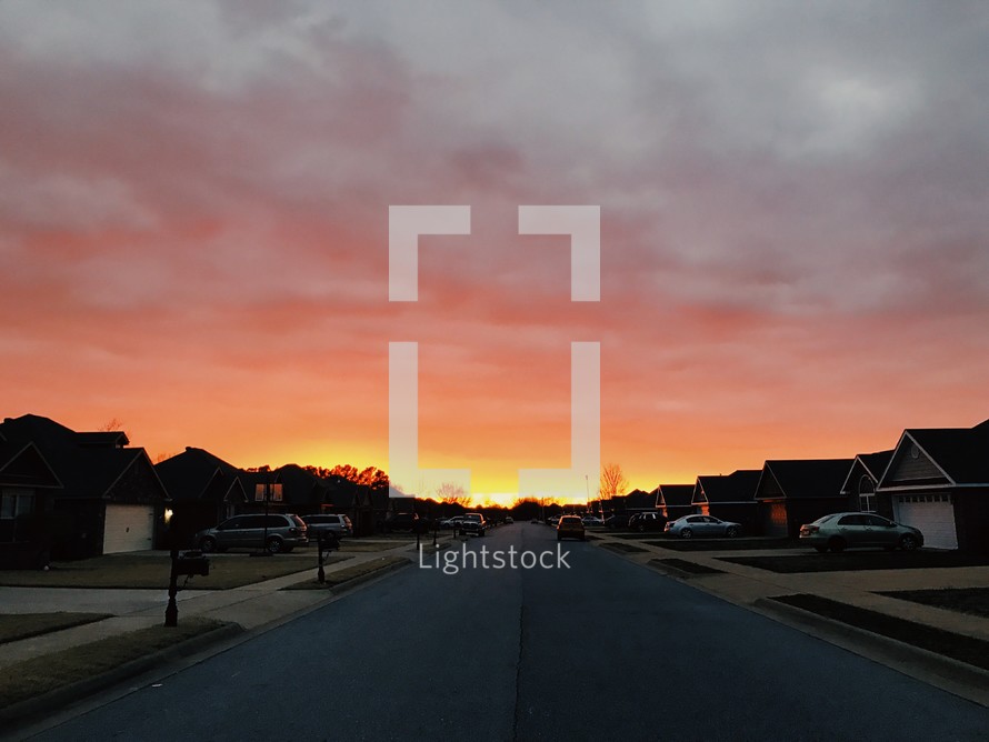 neighborhood street at sunset 