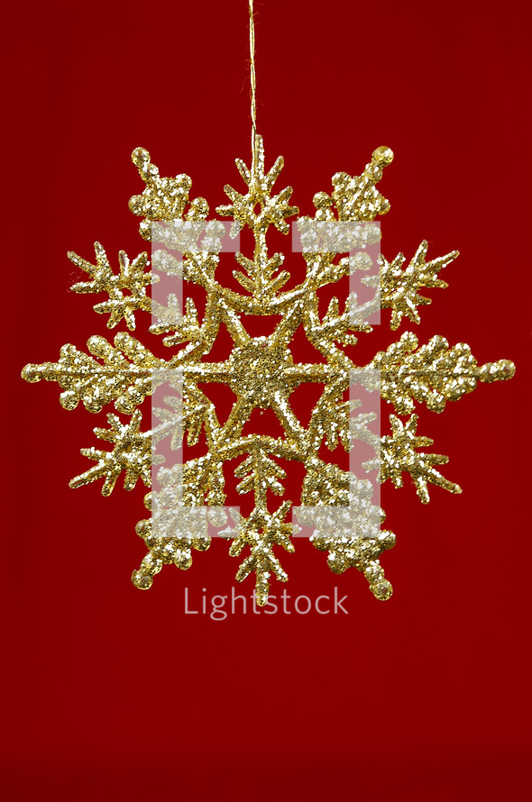 glittery gold snowflake ornament 