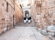 nuns walking on the sidewalks of Jerusalem 