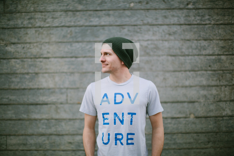 man wearing an Adventure t-shirt