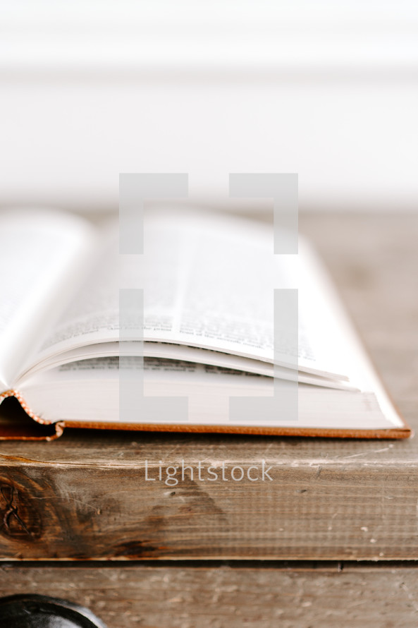 opened Bible on a table 