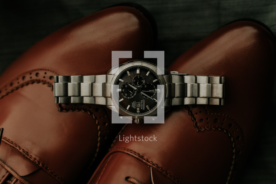 a watch on dress shoes 