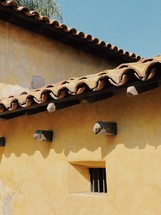 tile roof and exposed wood beams 