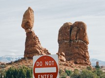 Do Not enter sign and rock peaks 