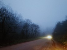 dense fog and headlights 