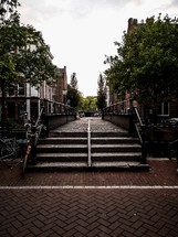 steps and brick pavers sidewalk in Amsterdam, Netherlands