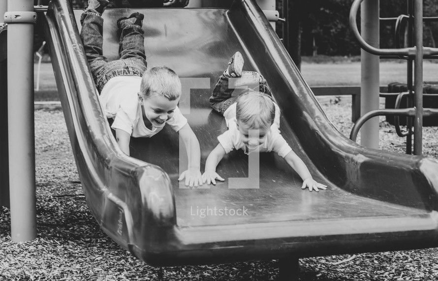 kids on a slide 