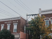 Golden Rule sign on a  brick building 