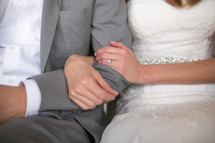 bride and groom arm in arm 