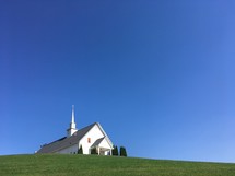 A local country church building on a hillside