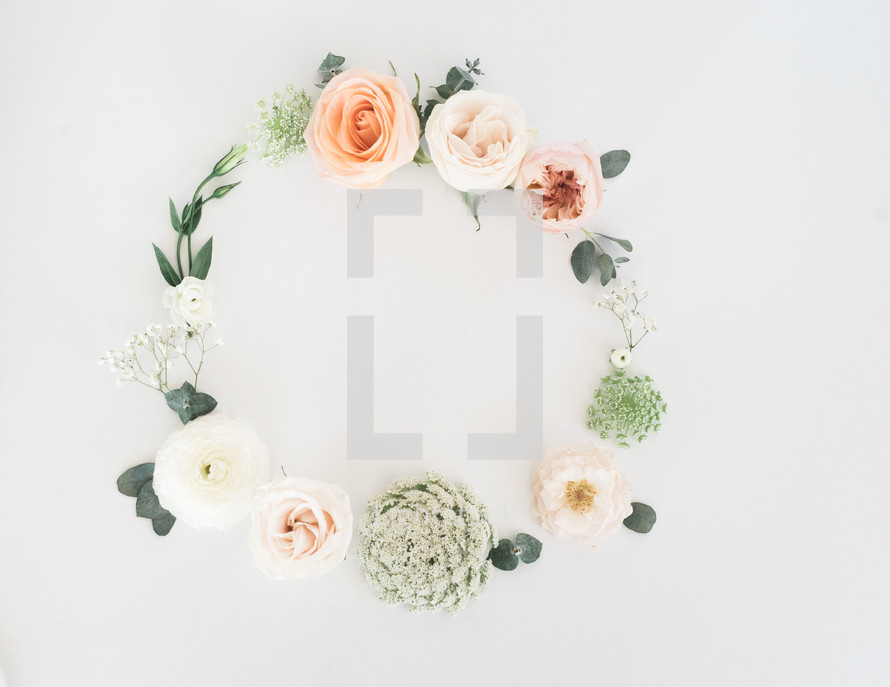 wreath of flowers on white background 