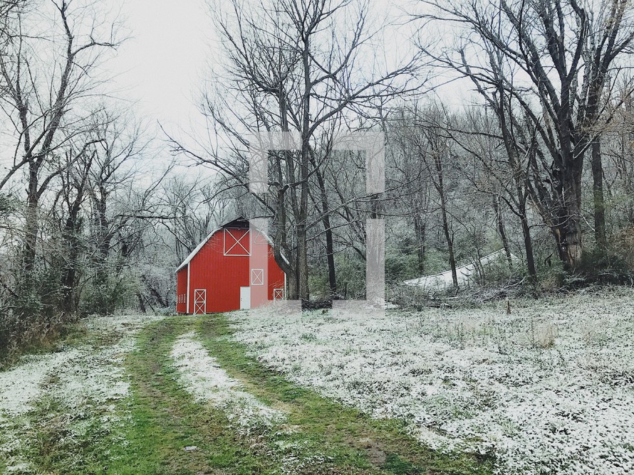 red barn and a dusting of snow 