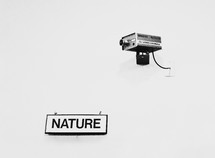 Nature sign and security camera 