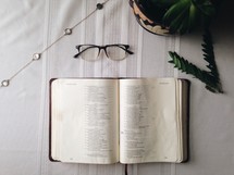open Bible and reading glasses 