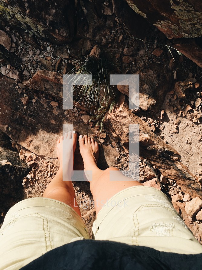 barefoot on desert rocks 